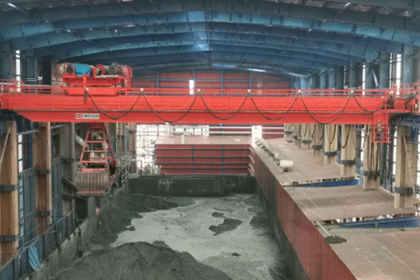 Intelligent bulk handling crane